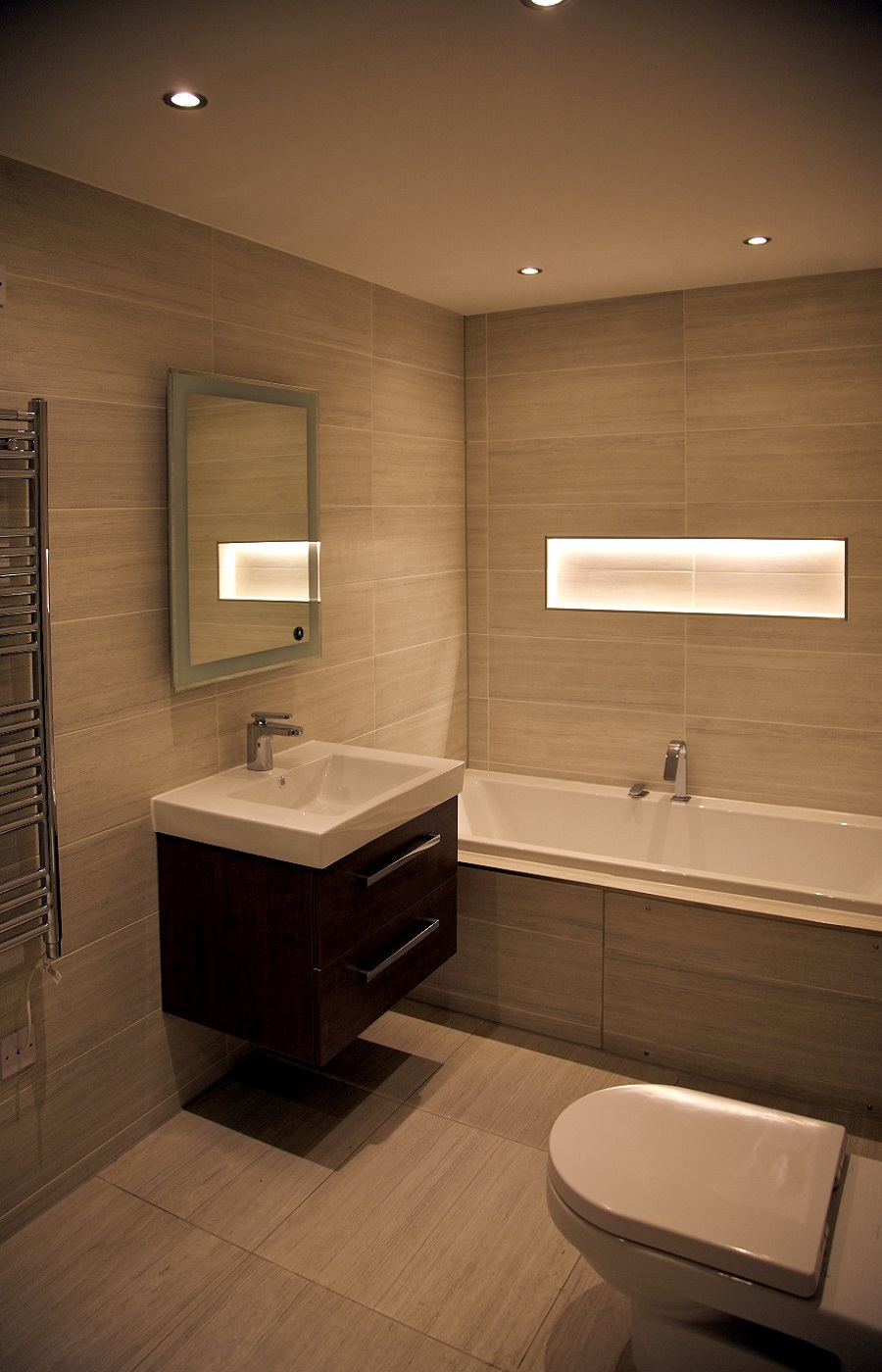 Classy bathroom with floating sink.